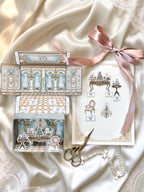 DIY château room paper craft kit with miniature furniture pieces and illustrated ballroom interior